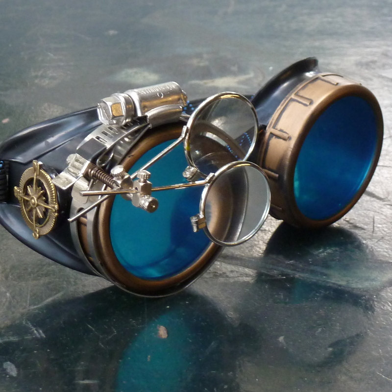 Black And Bronze Steampunk Goggles With Blue Lenses And Eye