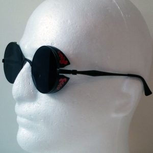 Round black sunglasses with red filigree side shields