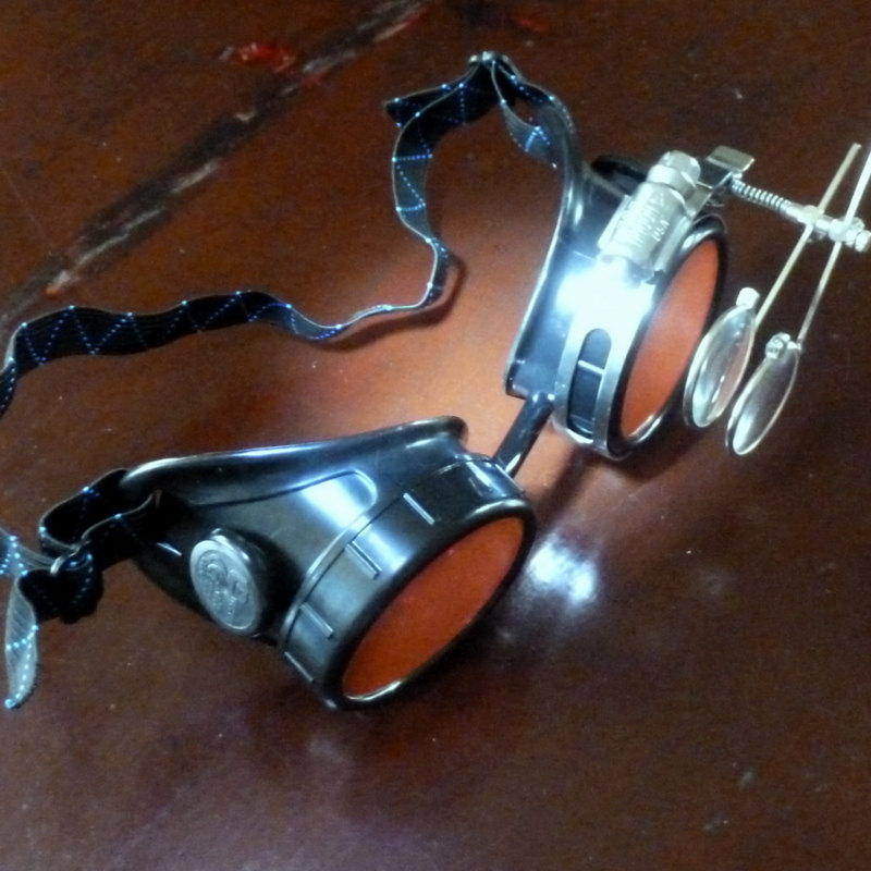 Black Goggles: Red Lenes w/ Brass Watch Movement & Eye Loupe