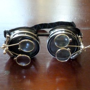 Black Goggles: Clear Lenses w/ Brass Watch Movement & Double Eye Loupes