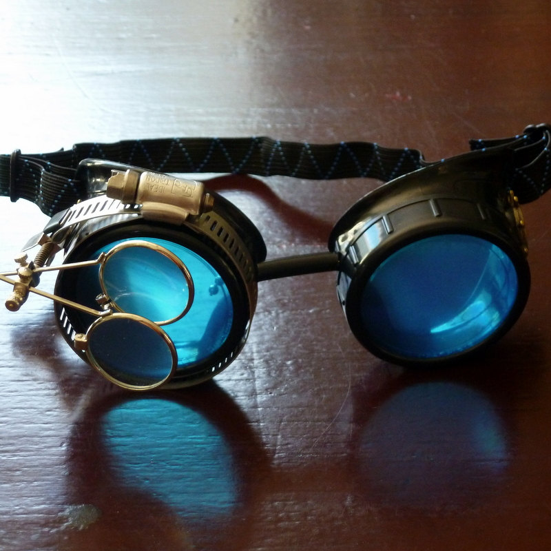 Black Goggles: Blue Lenses w/ Brass Ship's Wheel & Eye Loupe