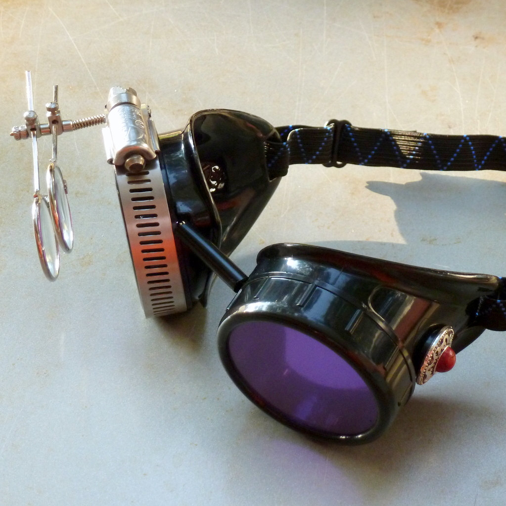 Black Goggles: Purple Lenses w/ Eye Loupe & Brownish-Red Turquoise Side Pieces