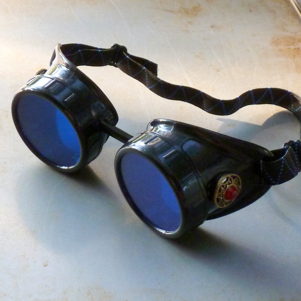 Black Goggles: Blue Lenses w/ Red Turquoise Side Pieces