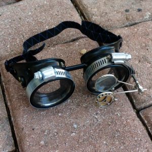 Black Goggles: Clear Lenses w/ Anchor & Design Eye Loupe