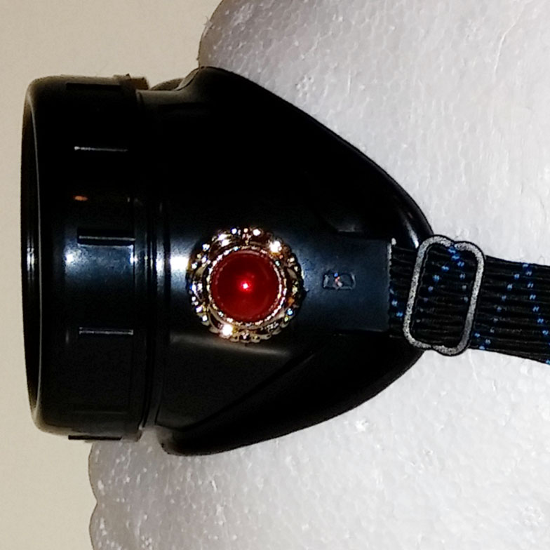 Red steampunk goggles - side, close-up