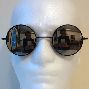 circle sunglasses with silver mirrored lenses and black frames - front